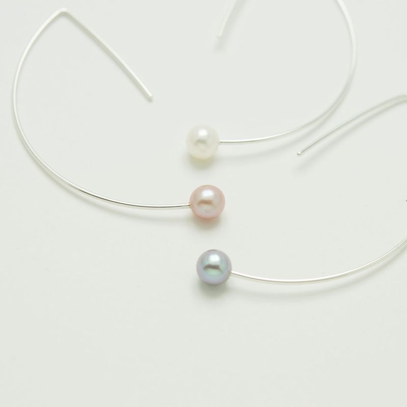 Arcs de cercle surdimensionnés avec perles.