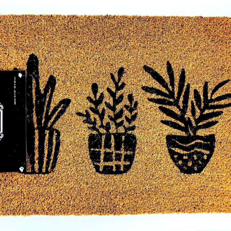 Tapis coco avec motif de plantes