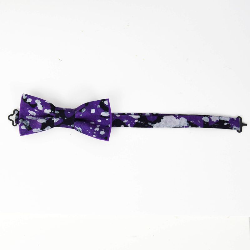 Noeud papillon mauve tacheté noir et blanc