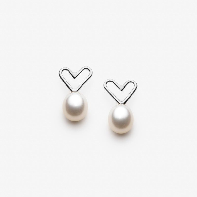 Boucles d'oreilles coeurs avec grosses perles blanches