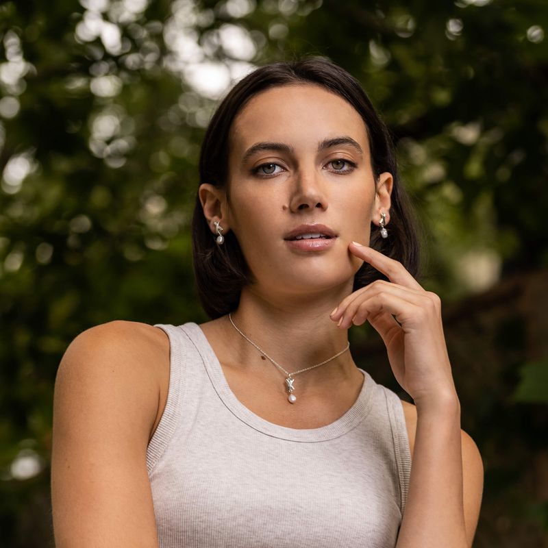 Déterminée - Boucles d’oreilles en forme de X - Option avec perle