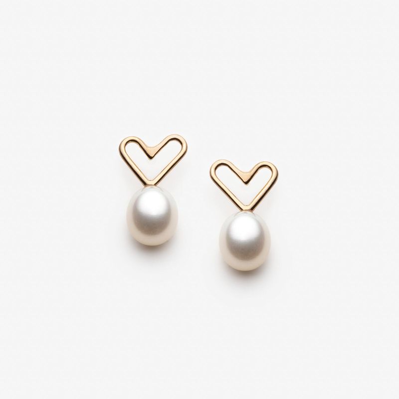 Boucles d'oreilles coeurs avec grosses perles blanches