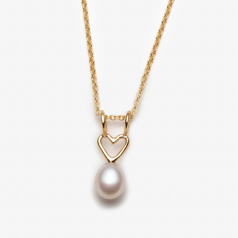 Collier avec breloque coeur et grosse perle blanche