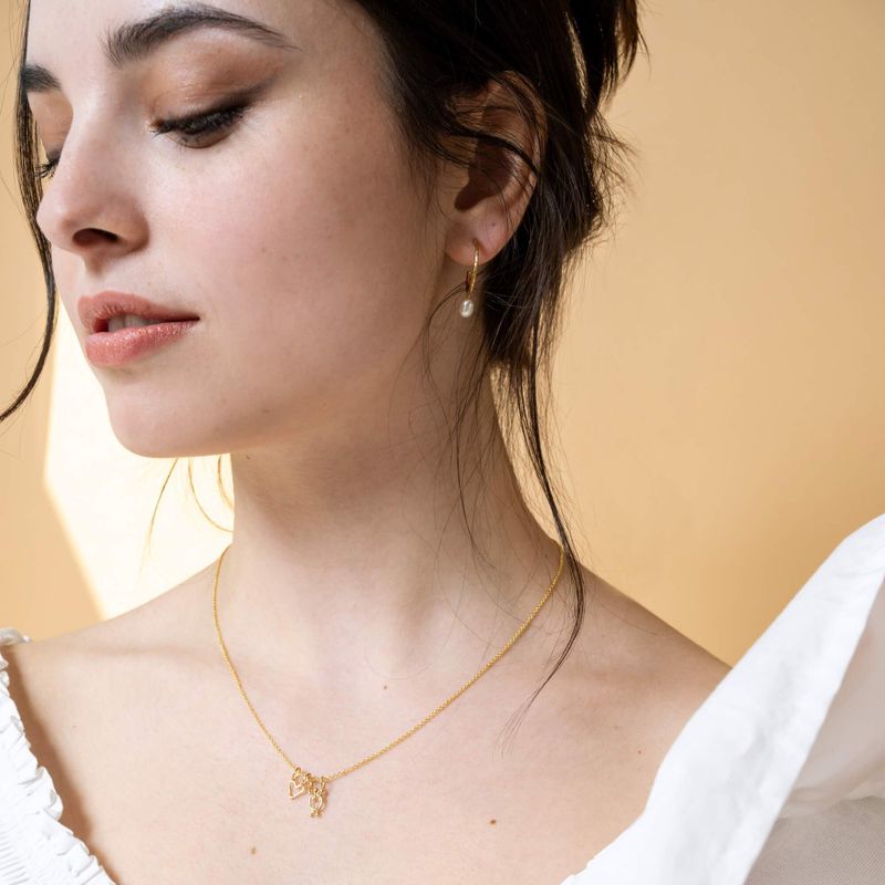 collier en argent coeur et garçon