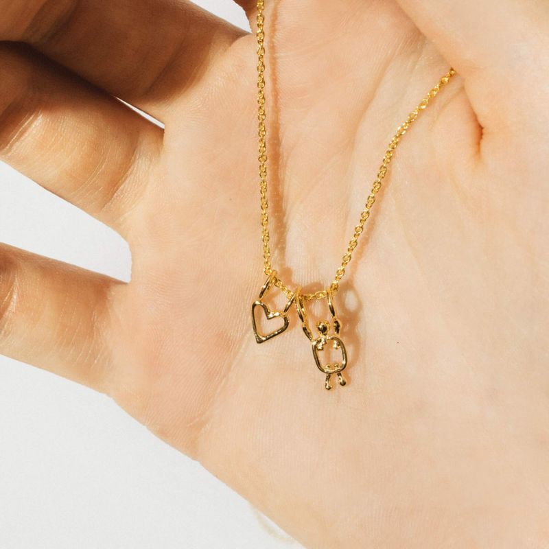 collier en argent coeur et garçon