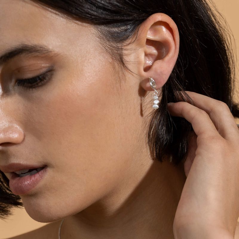 Enthousiaste - Boucles d'oreilles en forme de noeud avec ou sans breloque de perles