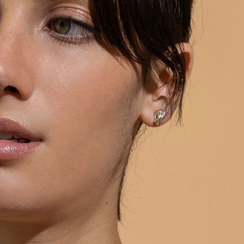 Enthousiaste - Boucles d'oreilles en forme de noeud avec ou sans breloque de perles