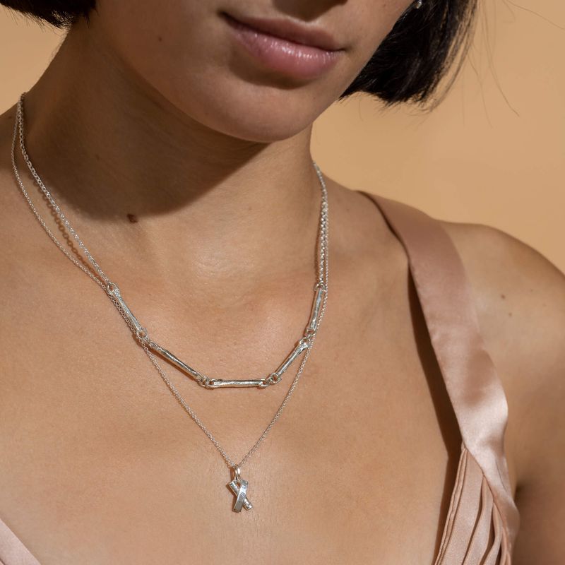 Loyale - Collier avec pendentif en forme de X