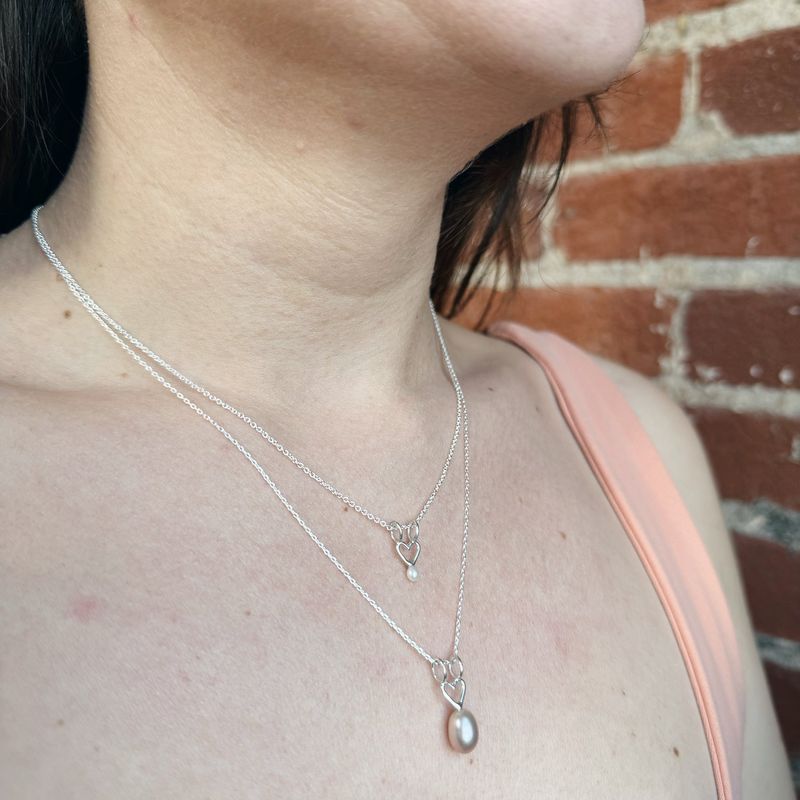 Collier avec breloque coeur et grosse perle rose