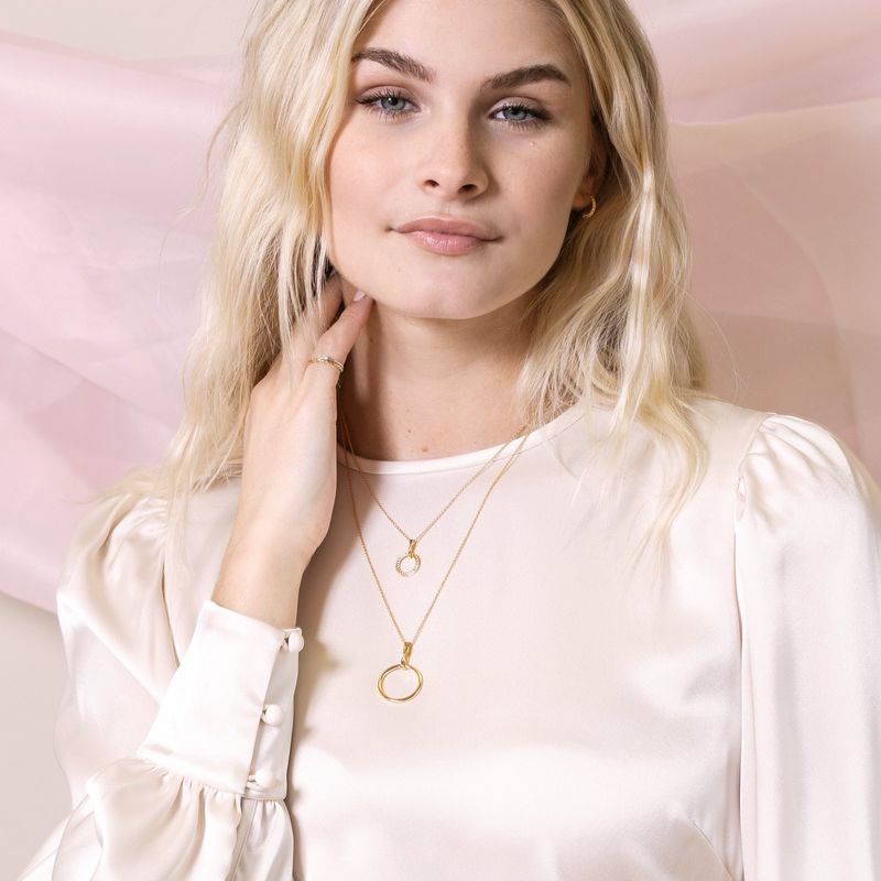 boucles d'oreilles avec perle blanche