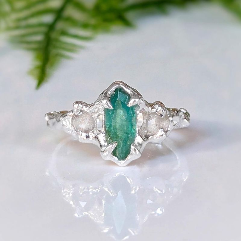Silver Emerald and diamond engagement ring