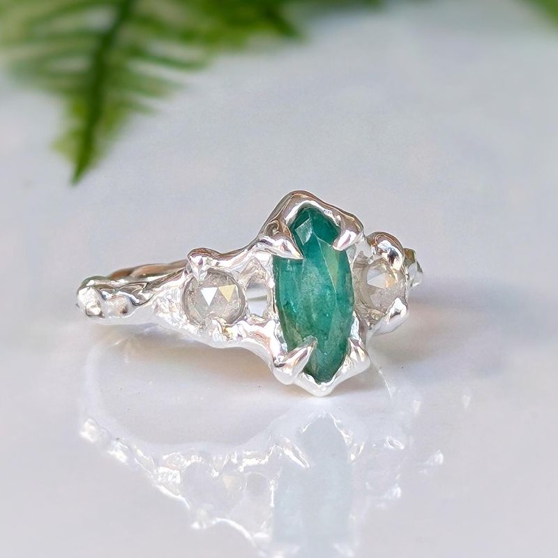 Silver Emerald and diamond engagement ring