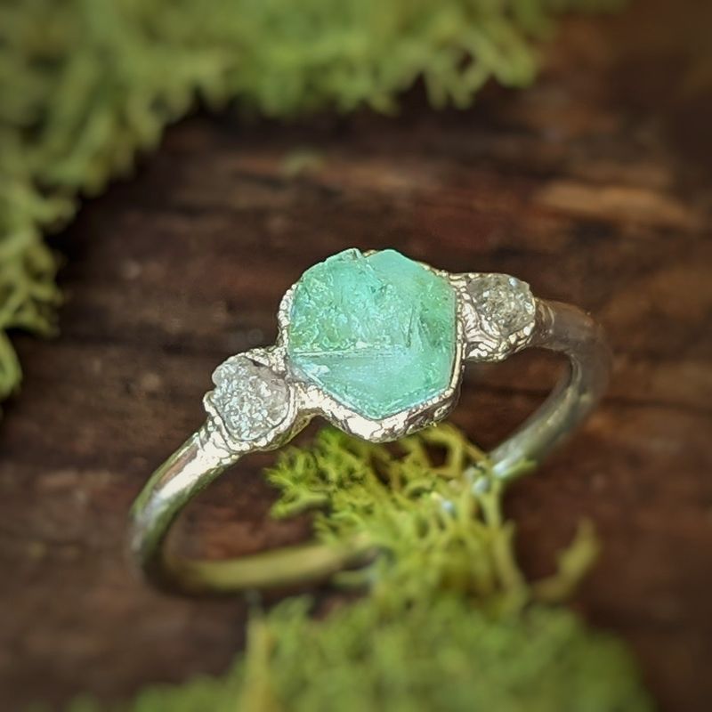 Raw Emerald and diamond engagement ring