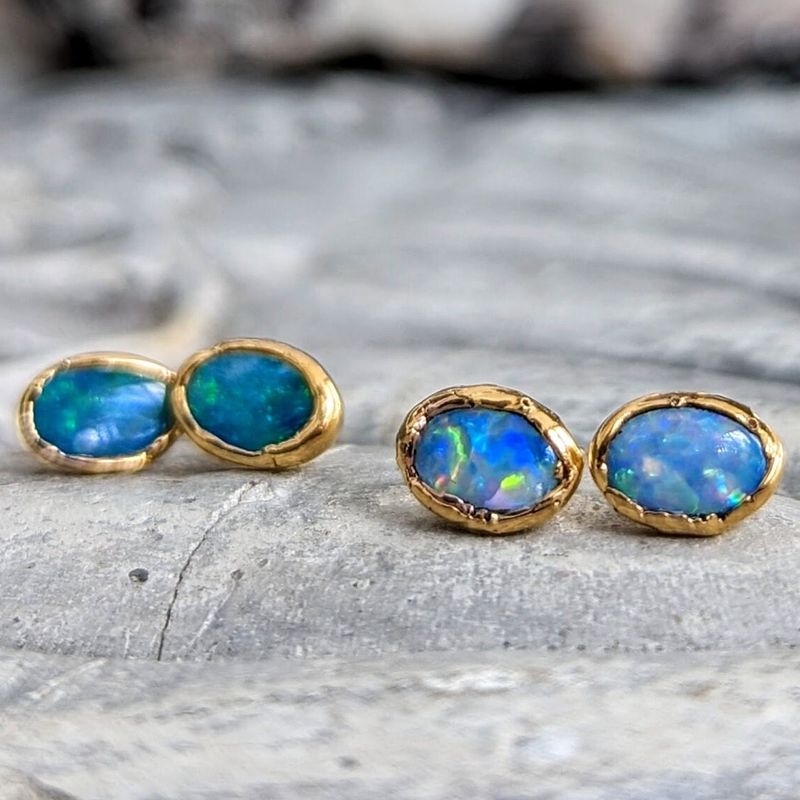 Blue Australian Opal stud earrings in 18k Gold