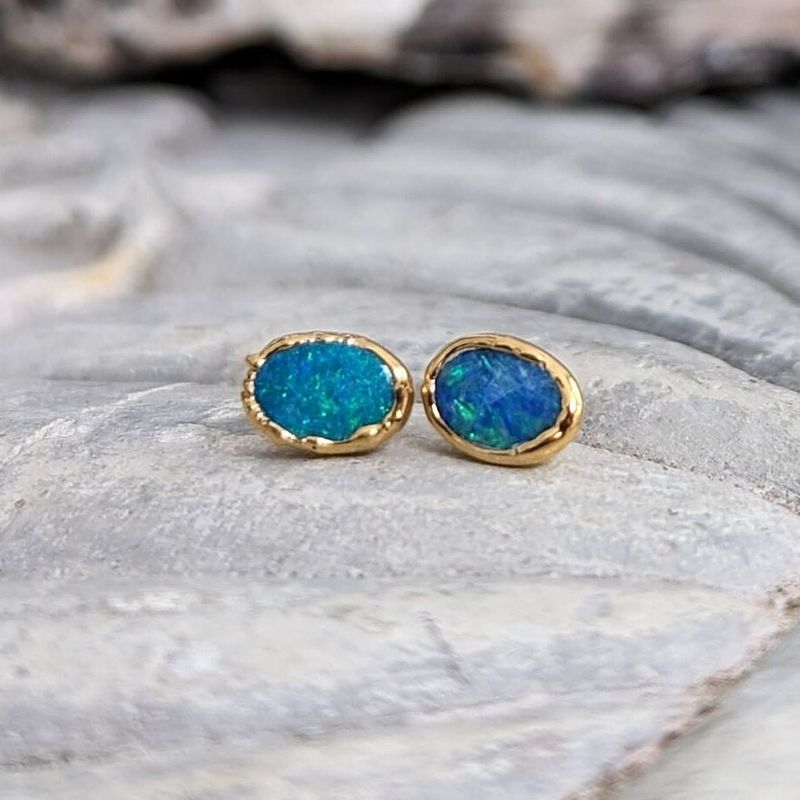 Blue Australian Opal stud earrings in 18k Gold