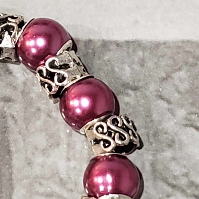 (P-009) Bracelet avec billes et breloques