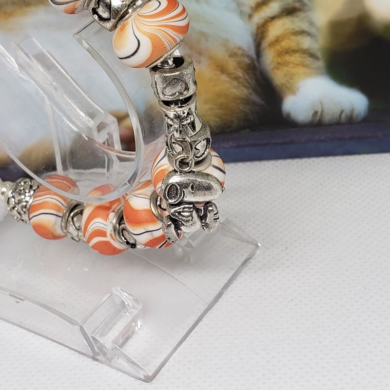 (P-043) Bracelet avec billes et breloques
