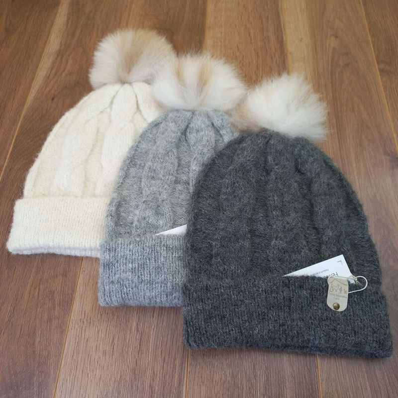 Women's alpaca hat with fur pompom