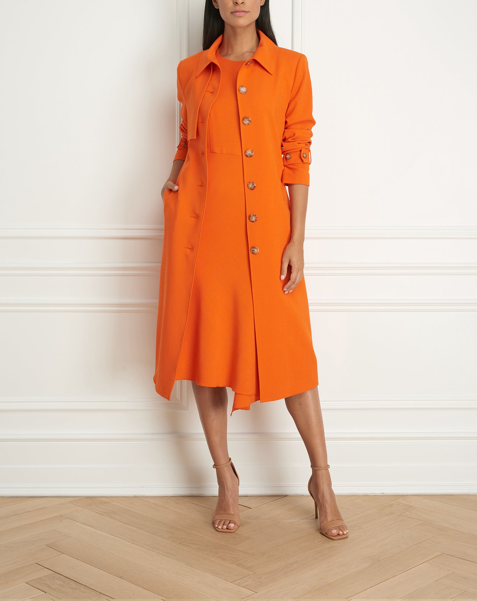 Spring coat with shoulder flap