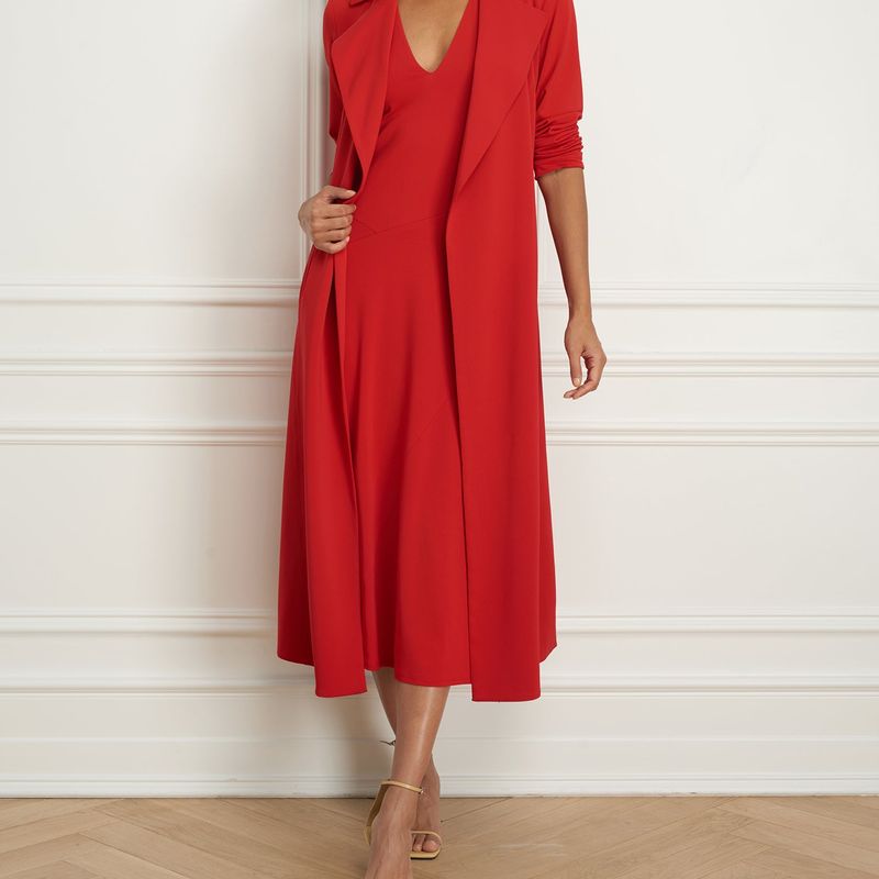 Sleeveless dress with panel cut skirt