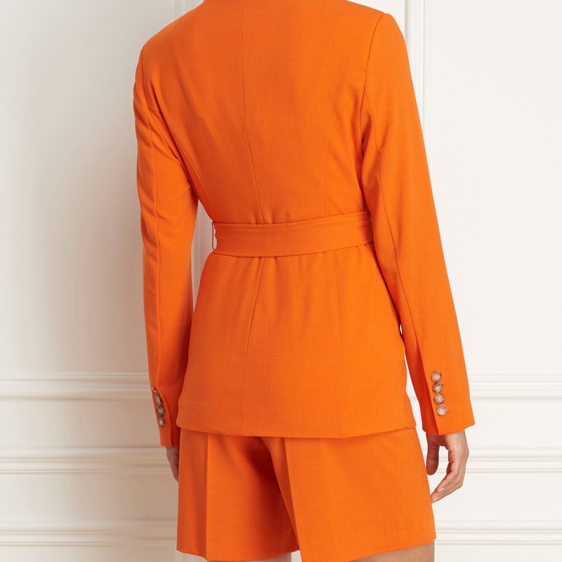 Collarless jacket with belt