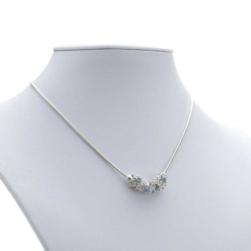 Collier avec un pouce de Shikshok classique, garni de turquoises