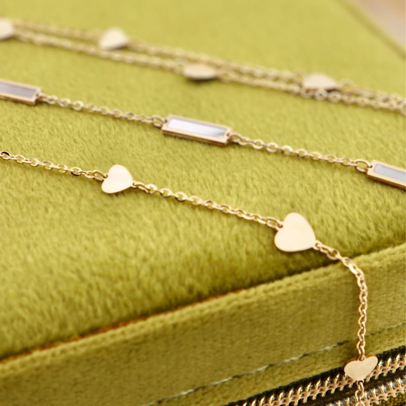Bracelet Coeurs en or 10K