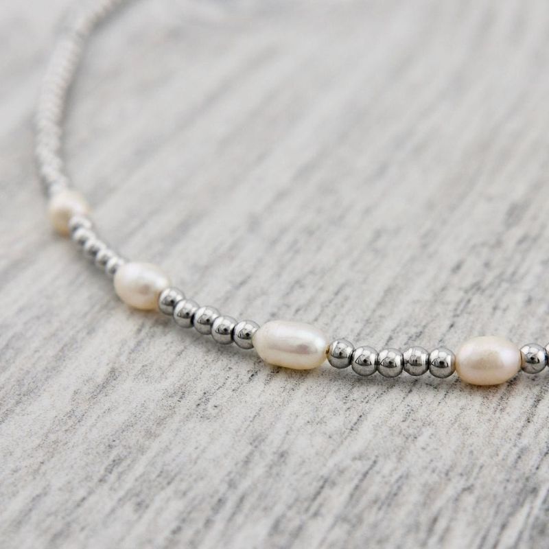 Collier Zéphyr en acier et perles