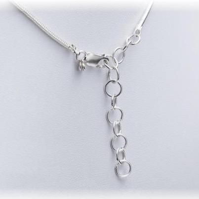 Collier avec un pouce de Shikshok classique en argent