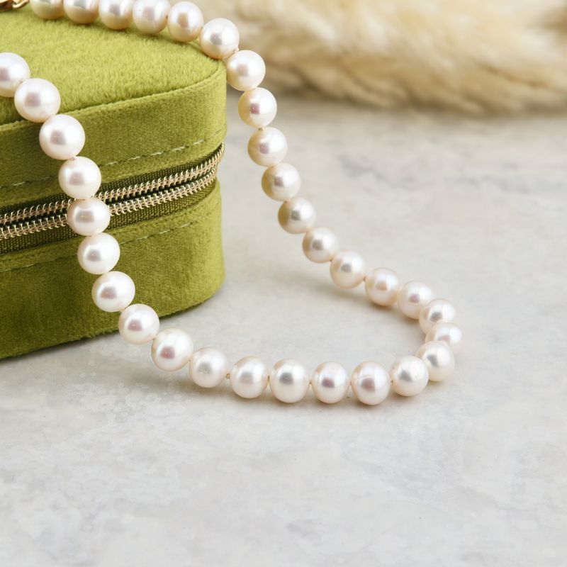 Collier de perles 8 mm et or 14K