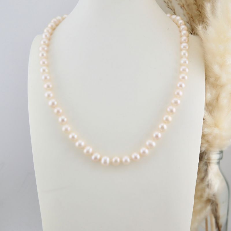Collier de perles 5.5 mm et or 14K